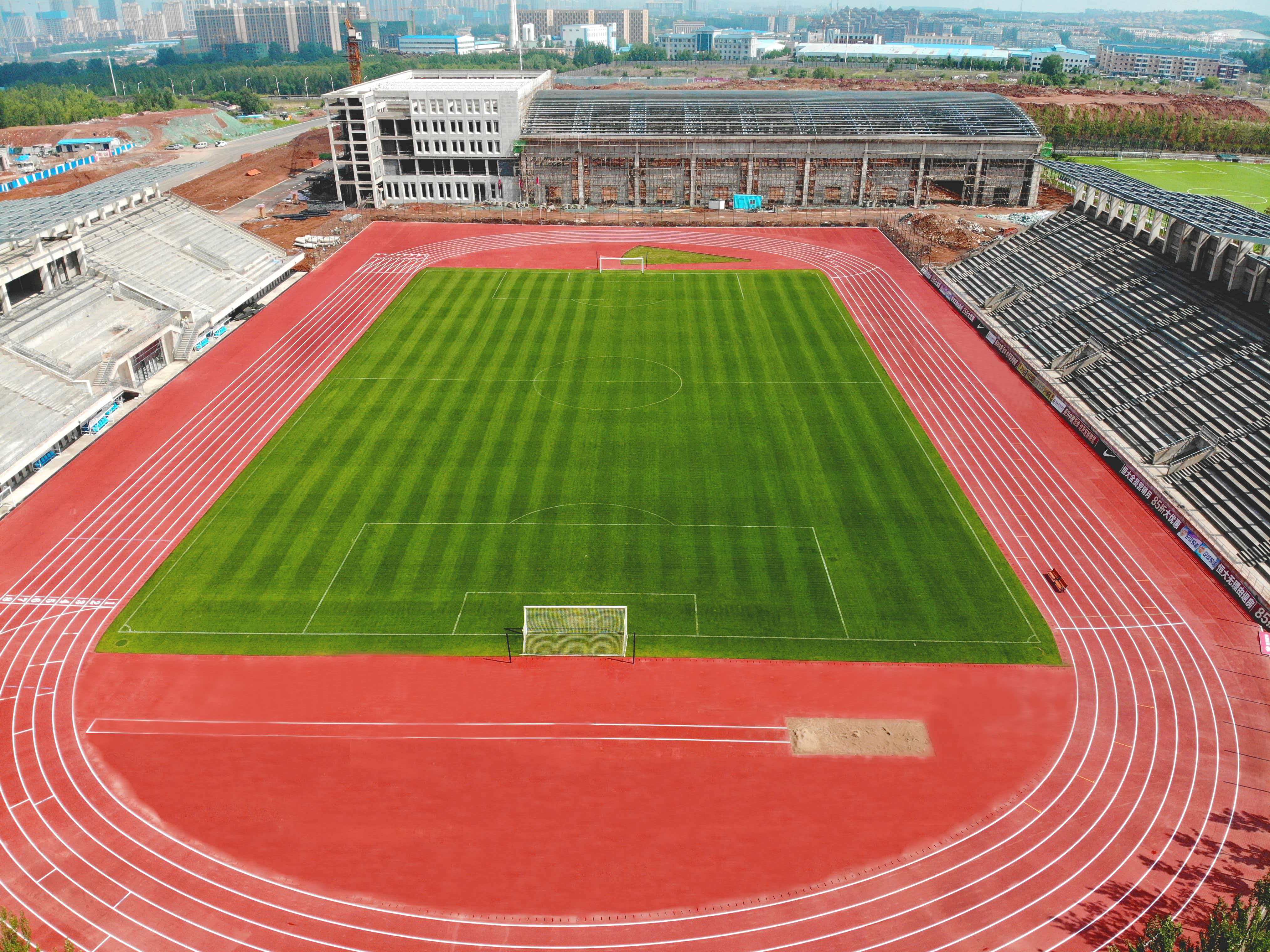 襄阳市半预制型跑道新国标塑胶跑道 - 方案
